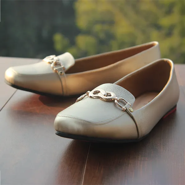 Golden Pumps for women.